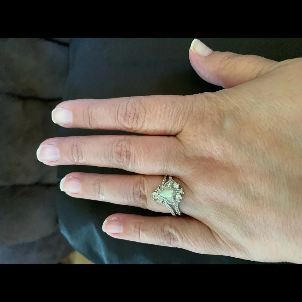 Silver tone teardrop shape faux pearl ring with crystals